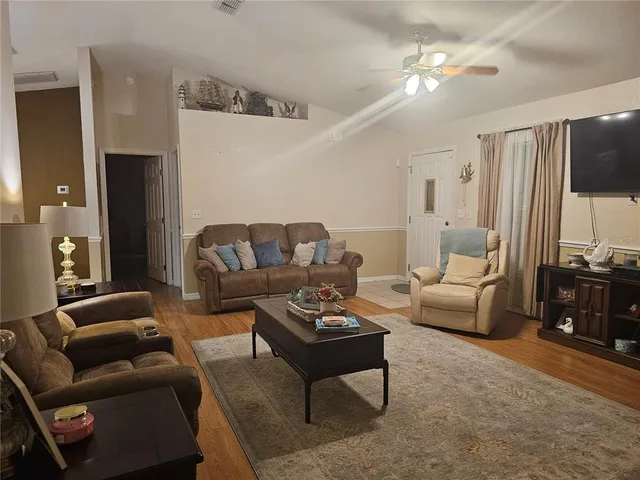 a living room with furniture and a couch