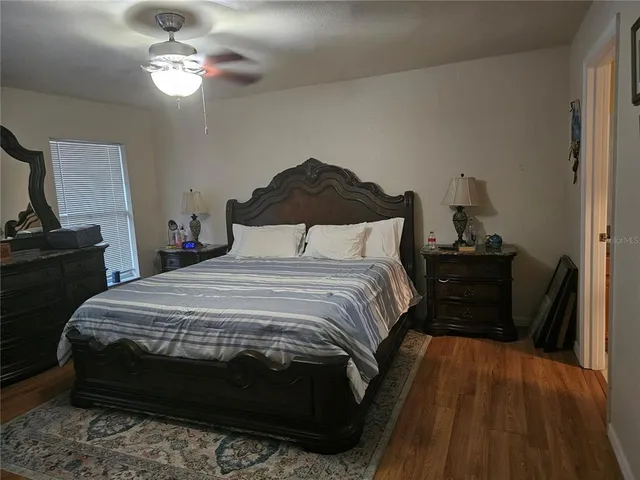 a bathroom with a sink toilet and a mirror