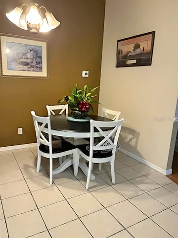 a view of a living room and dining room