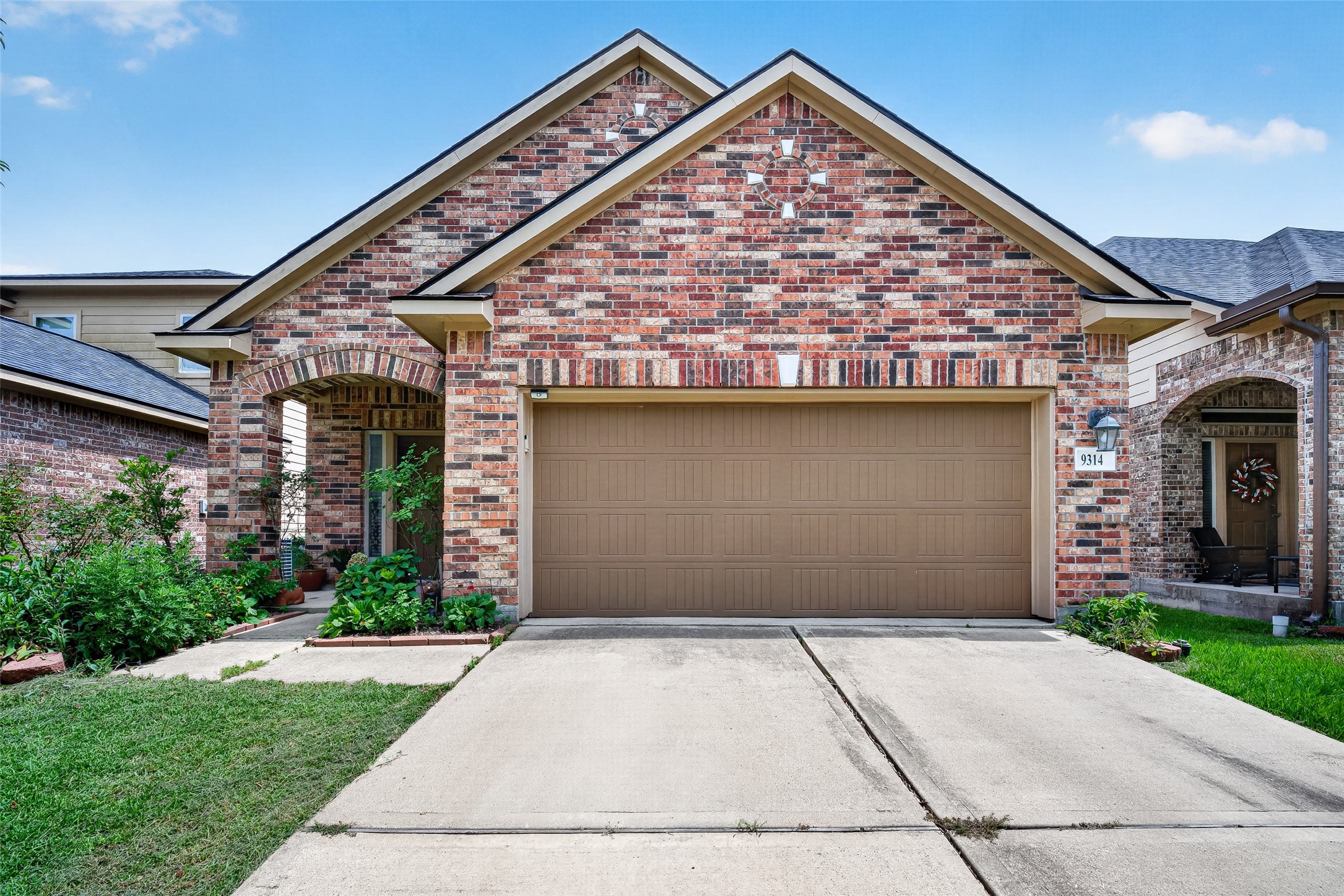 9314 Fuqua Ridge Lane Houston, TX 77075 - Photo 1 of 24 a view of a house with a garden