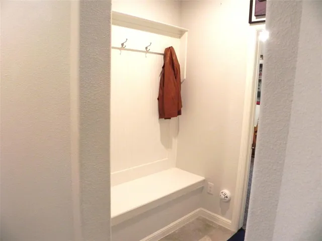 a bathroom with a shower and a tub
