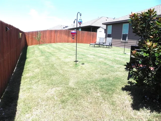 a house view with a outdoor space