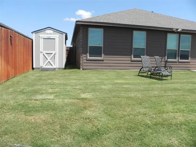 a front view of a house with patio