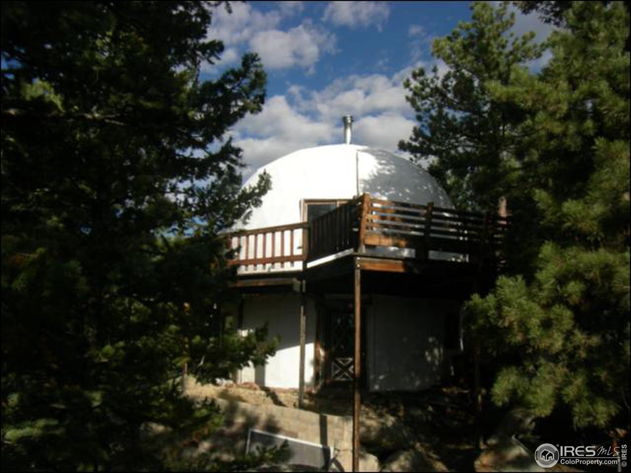 1488 Gold Run Road Boulder, CO 80302 - Photo 1 of 17 a view of a house with a tree