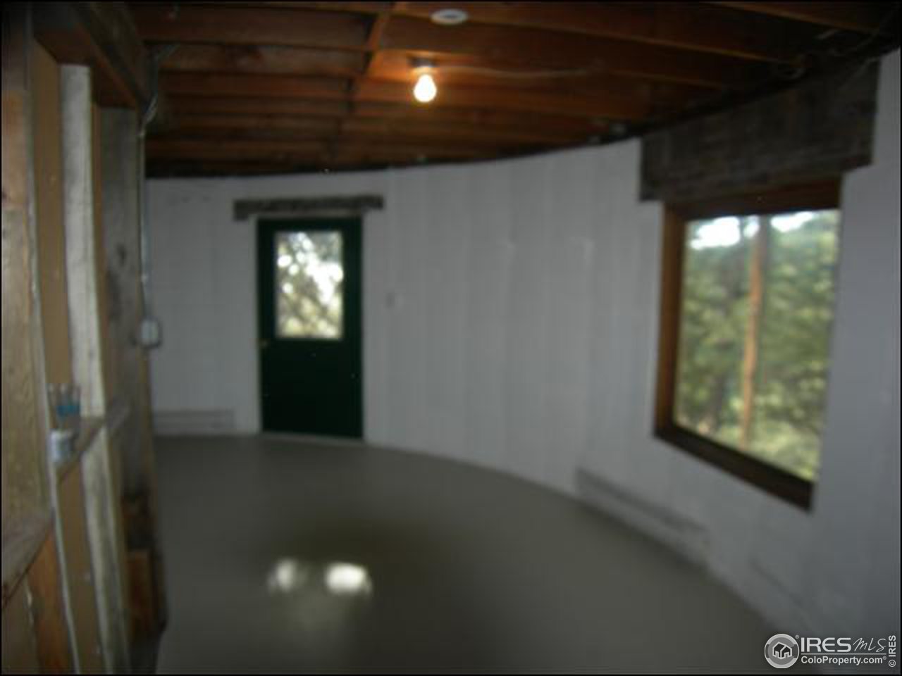 1488 Gold Run Road Boulder, CO 80302 - Photo 15 of 17 a view of hallway with a window