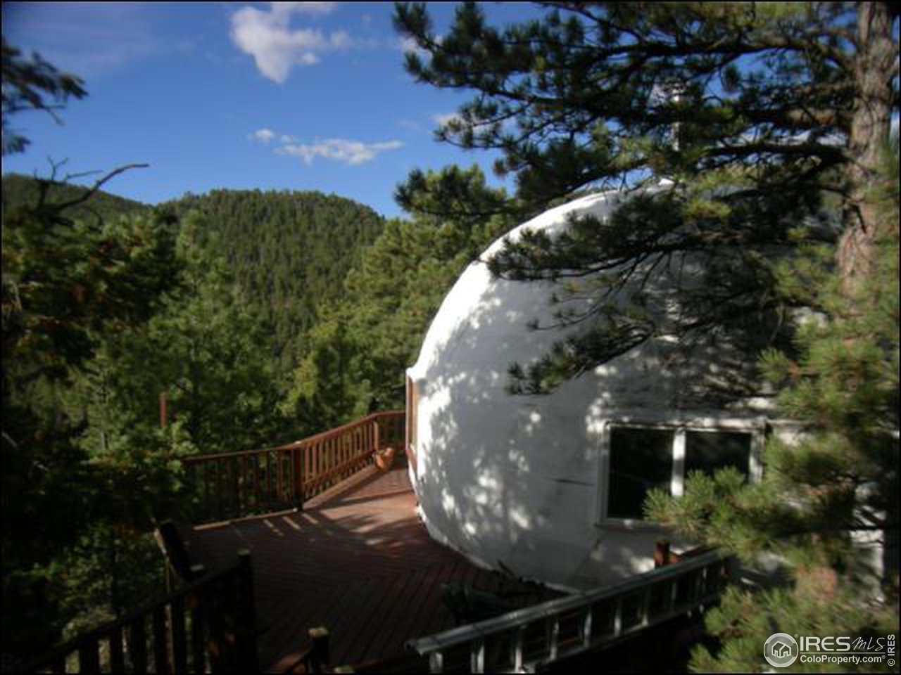 1488 Gold Run Road Boulder, CO 80302 - Photo 16 of 17 a view of a fountain in front of the house