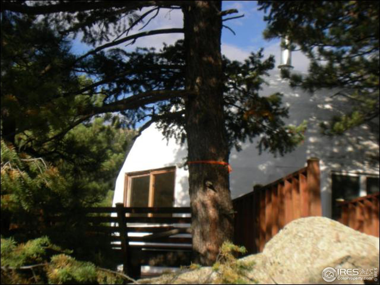 1488 Gold Run Road Boulder, CO 80302 - Photo 2 of 17 a view of a backyard of the house