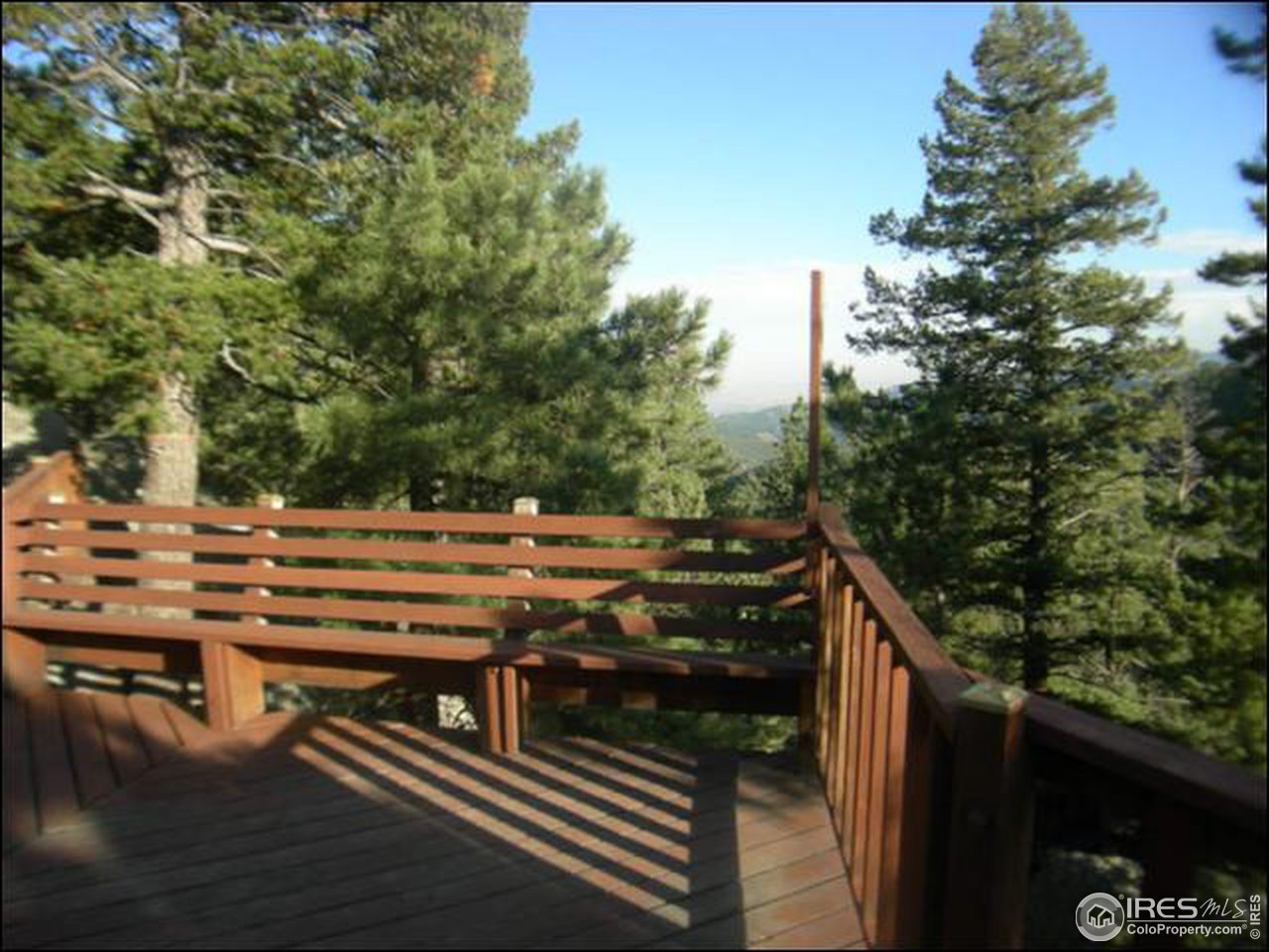 1488 Gold Run Road Boulder, CO 80302 - Photo 3 of 17 a view of a balcony with chairs