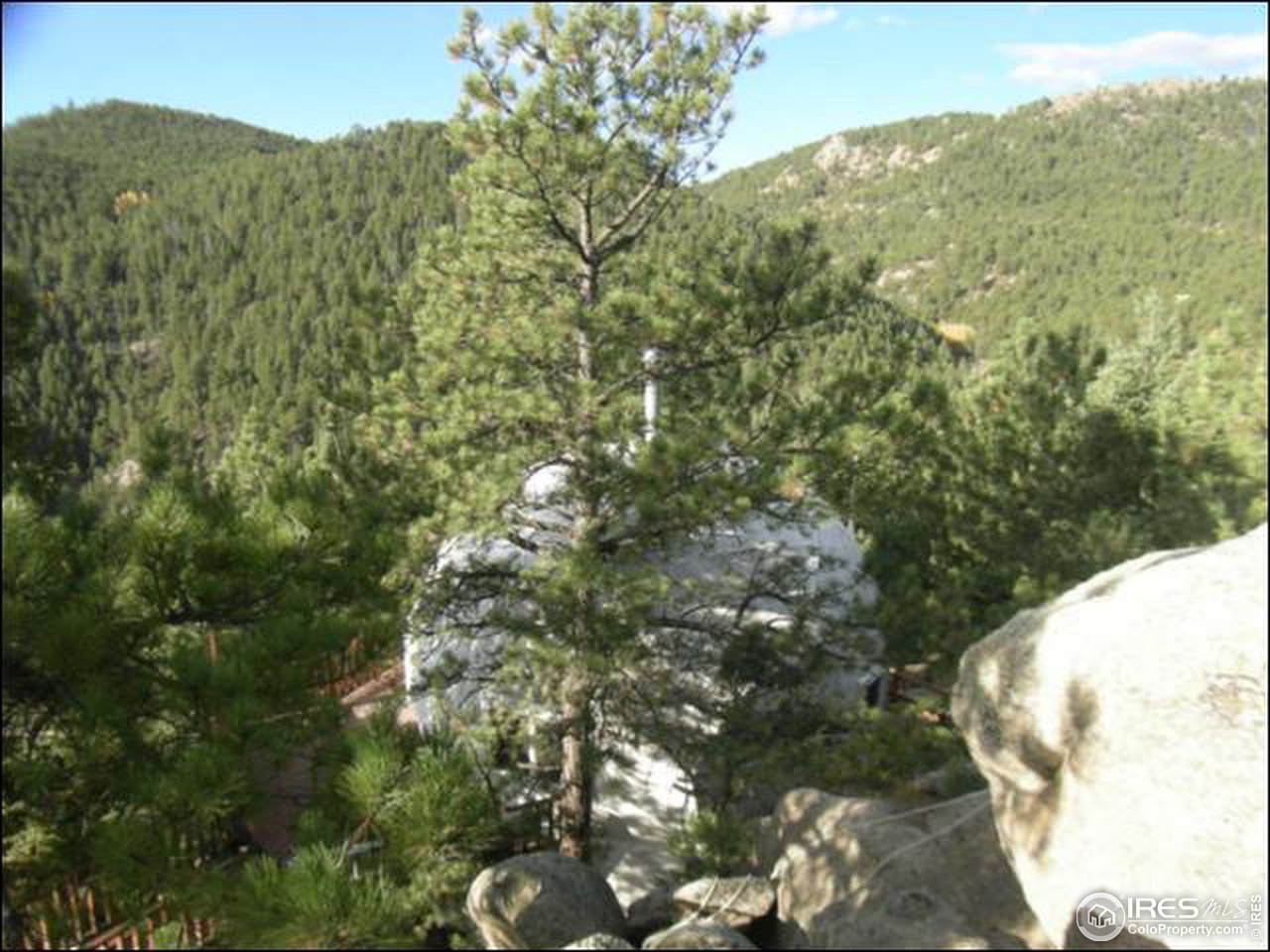 1488 Gold Run Road Boulder, CO 80302 - Photo 4 of 17 a view of a mountain in the distance