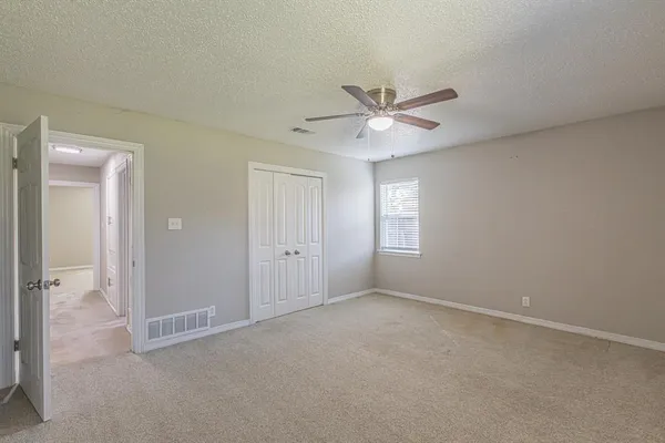 a house view with a garden space