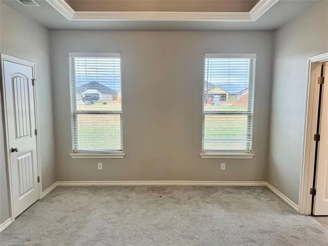 an empty room with windows