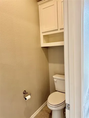 a bathroom with a toilet