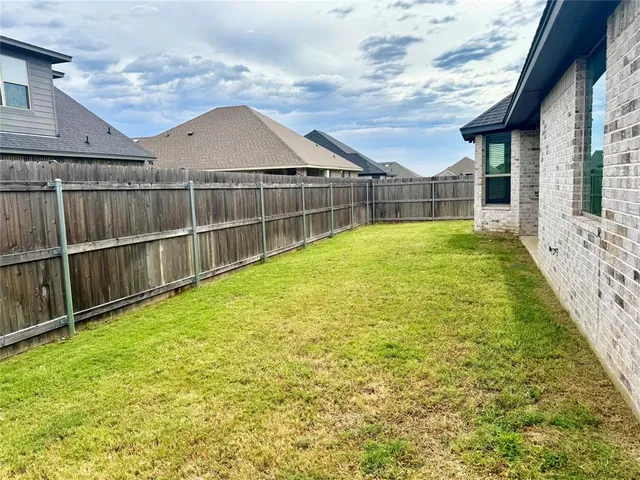 a view of an outdoor space and a yard