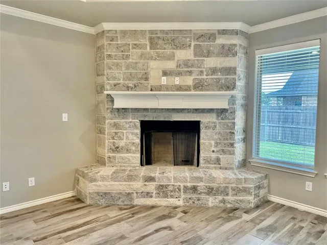 a living room with a fireplace