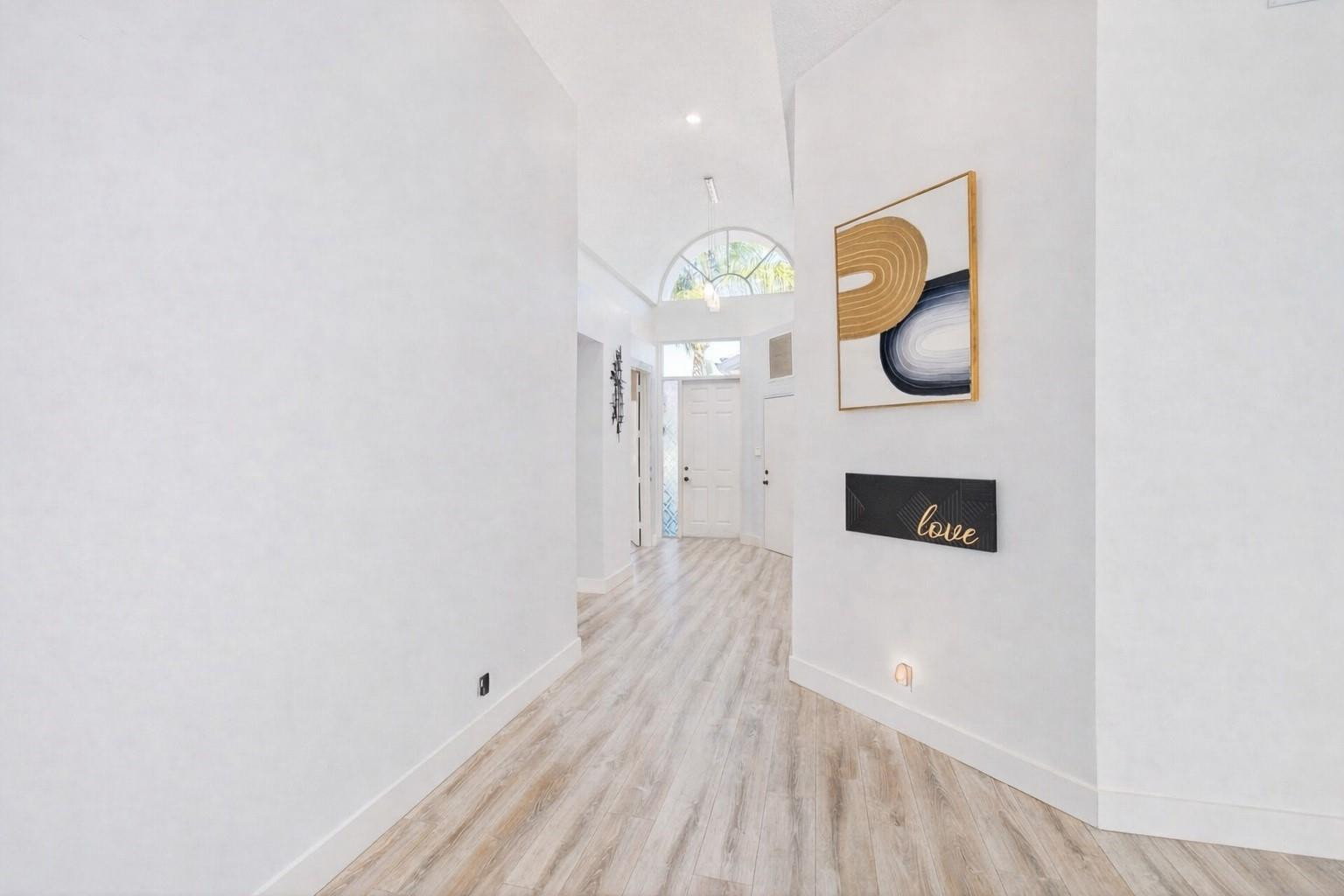 6584 Hampton Circle Boca Raton, FL 33496 - Photo 11 of 84 Foyer/Hallway now painted white