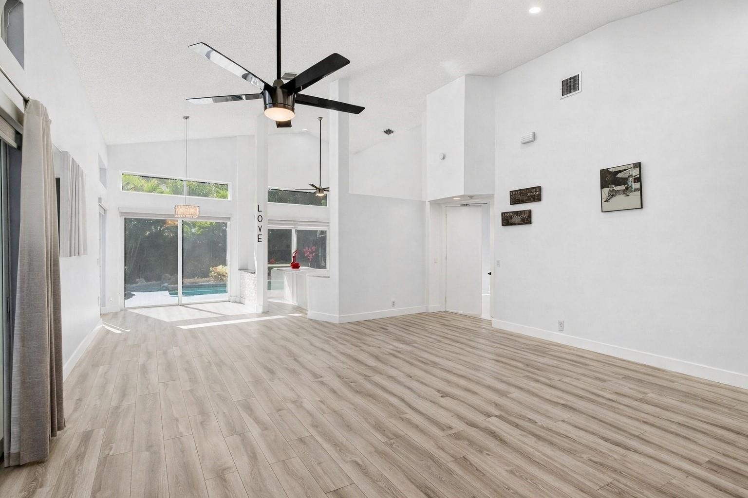 6584 Hampton Circle Boca Raton, FL 33496 - Photo 13 of 84 Family room now painted white