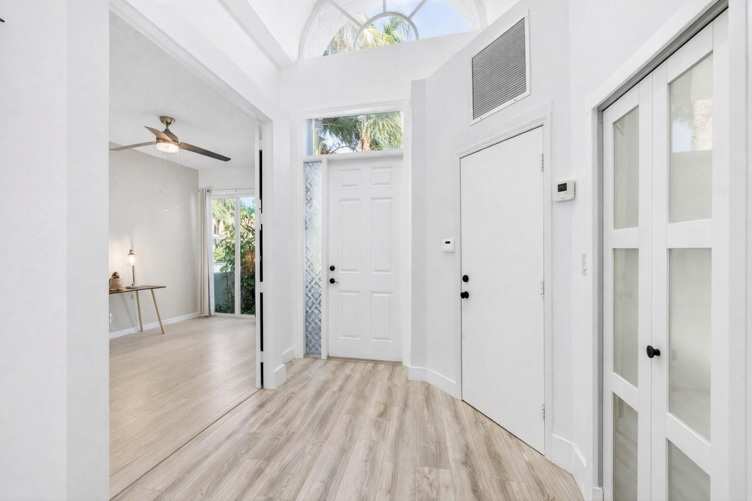 6584 Hampton Circle Boca Raton, FL 33496 - Photo 10 of 84 Foyer now painted white