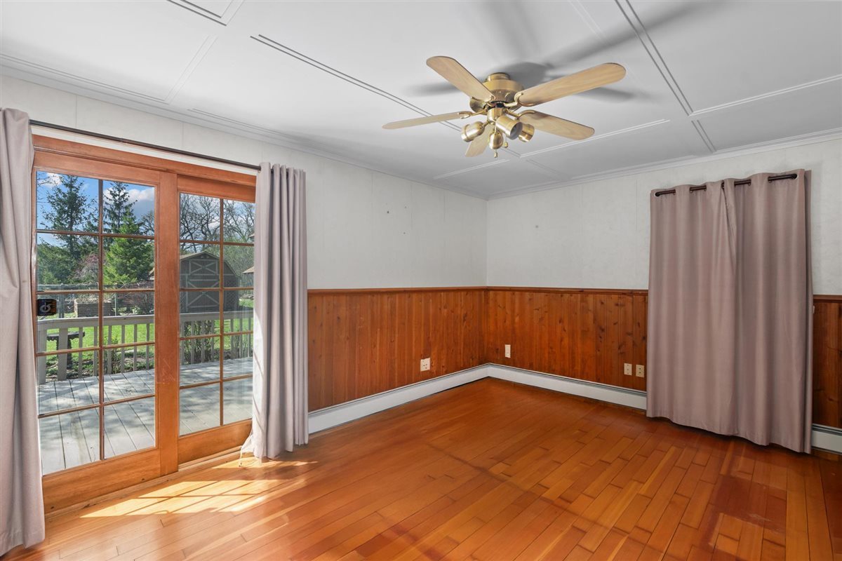 1760 Telegraph Road Lake Forest, IL 60045 - Photo 18 of 50 an empty room with windows and fan
