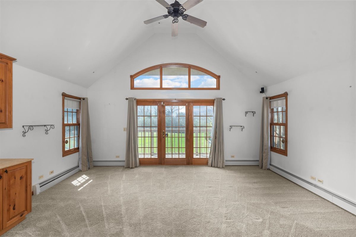 1760 Telegraph Road Lake Forest, IL 60045 - Photo 28 of 50 an empty room with windows and fan