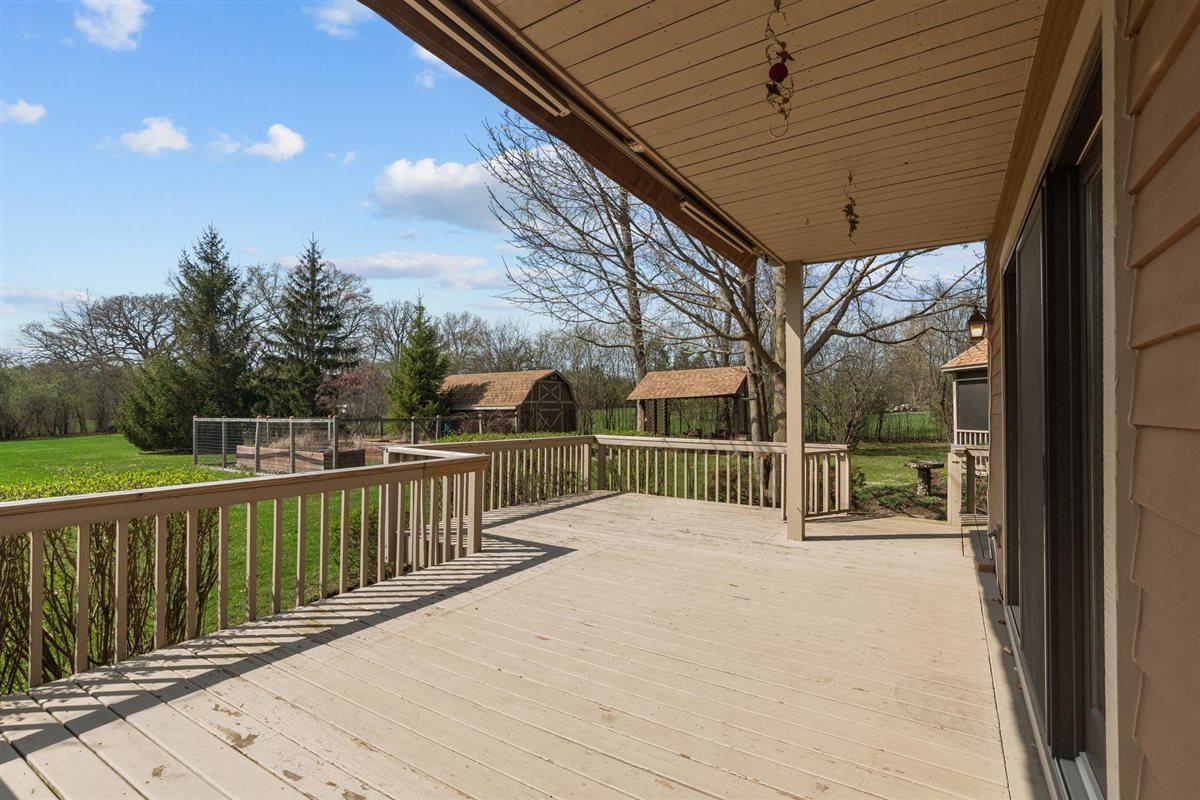 1760 Telegraph Road Lake Forest, IL 60045 - Photo 34 of 50 a view of deck with wooden floor and fence next to a yard