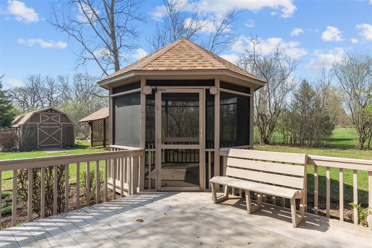 1760 Telegraph Road Lake Forest, IL 60045 - Photo 35 of 50 a view of a wooden house with a yard and furniture