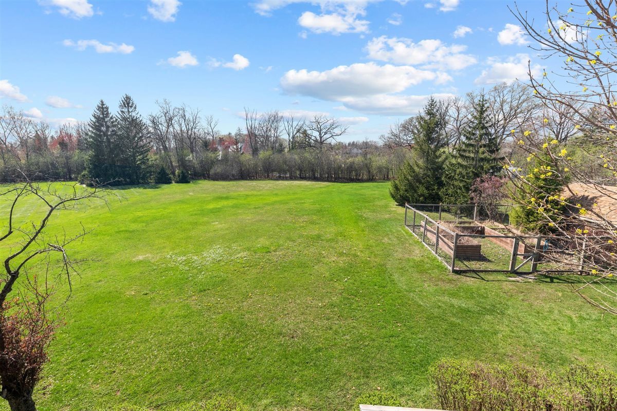 1760 Telegraph Road Lake Forest, IL 60045 - Photo 39 of 50 a garden with trees in the background