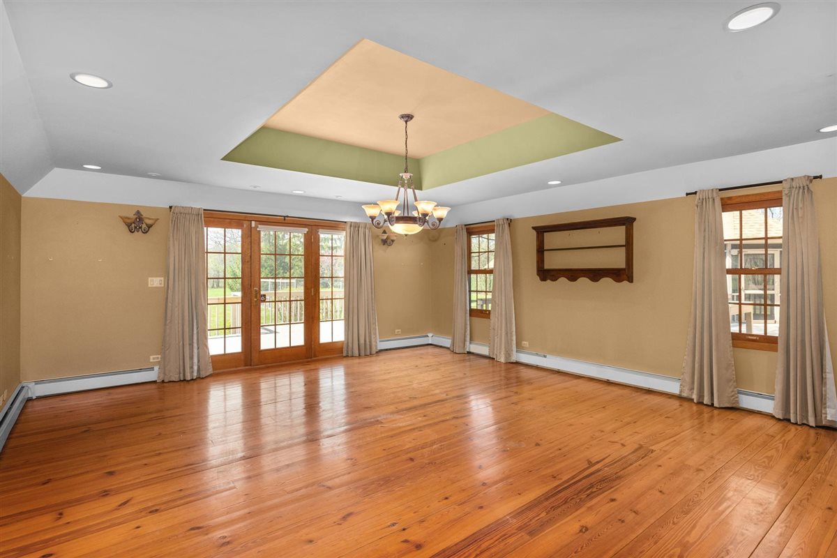 1760 Telegraph Road Lake Forest, IL 60045 - Photo 8 of 50 a view of an empty room with window and wooden floor