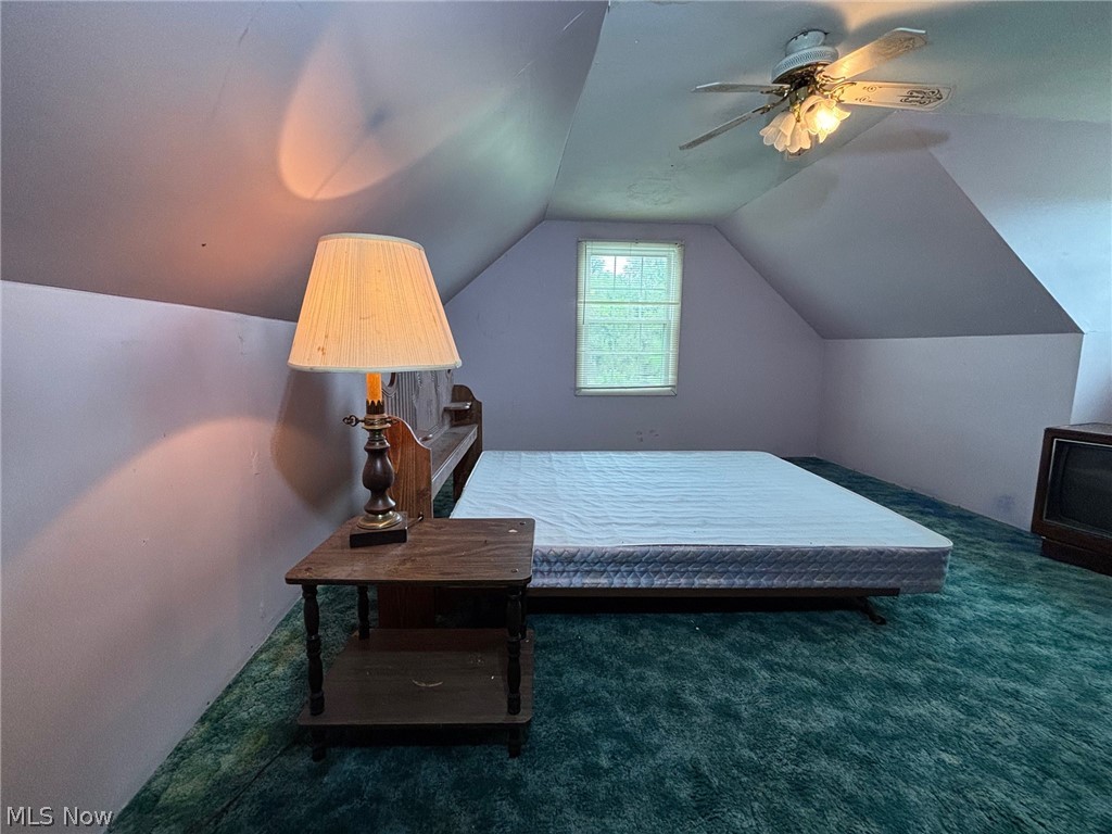 57575 Marietta Road Byesville, OH 43723 - Photo 15 of 25 Attic space with sloped ceilings and a window