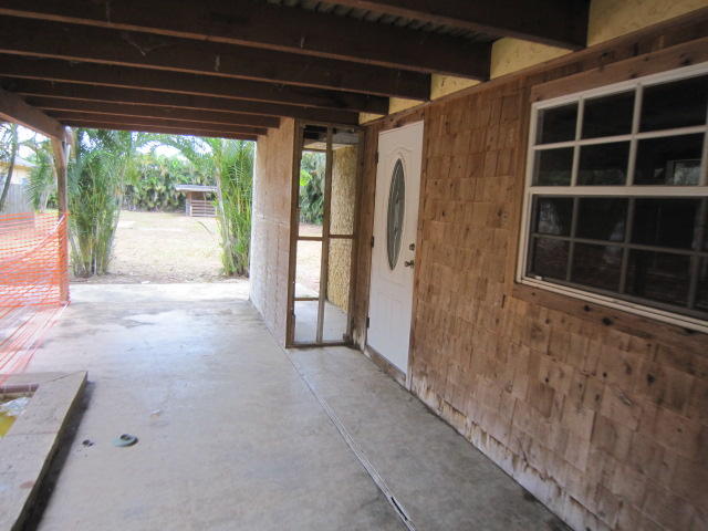 5590 Colbright Road Lake Worth, FL 33467 - Photo 2 of 22 Rear patio