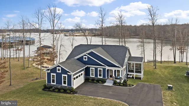 a view of a patio with table and chairs