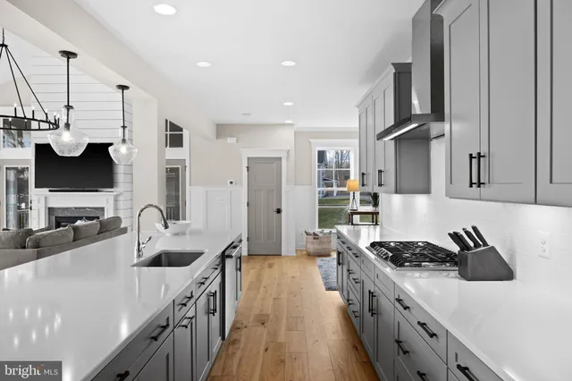 a bedroom with furniture and a flat screen tv
