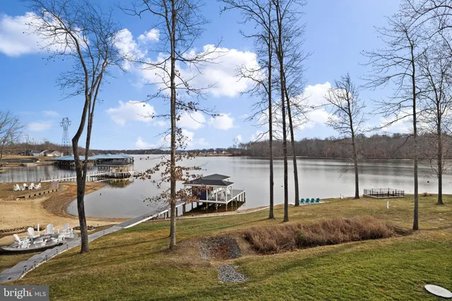 a kitchen with refrigerator a stove and a sink