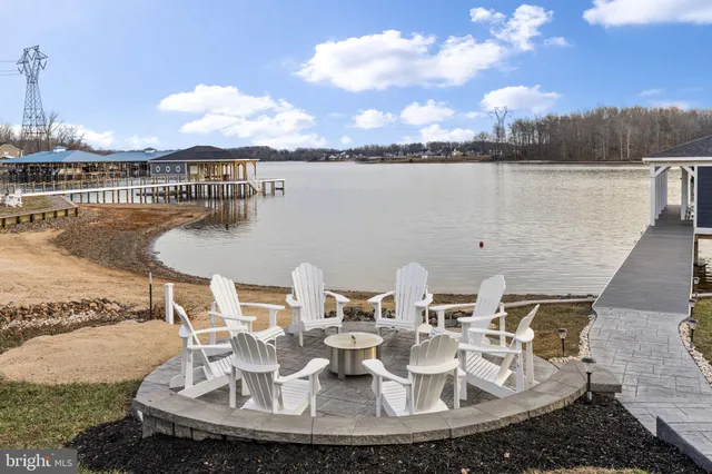 a view of a living room and chandelier