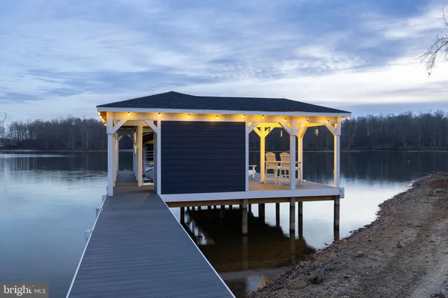 a kitchen with stainless steel appliances and refrigerator