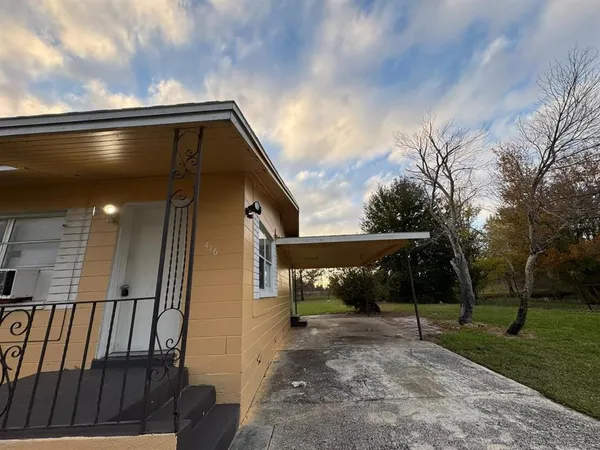 a view of backyard with green space