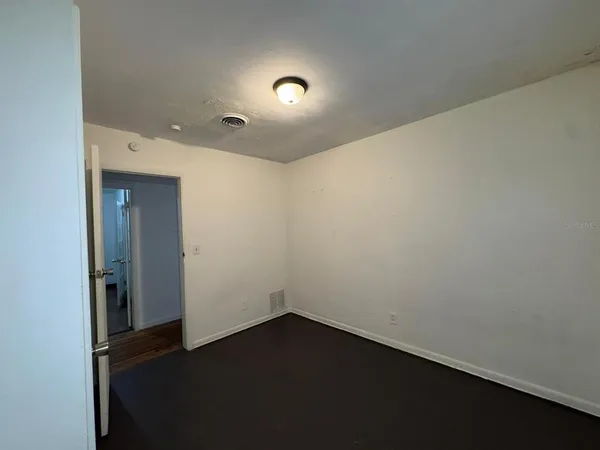 a kitchen that has a sink and a stove