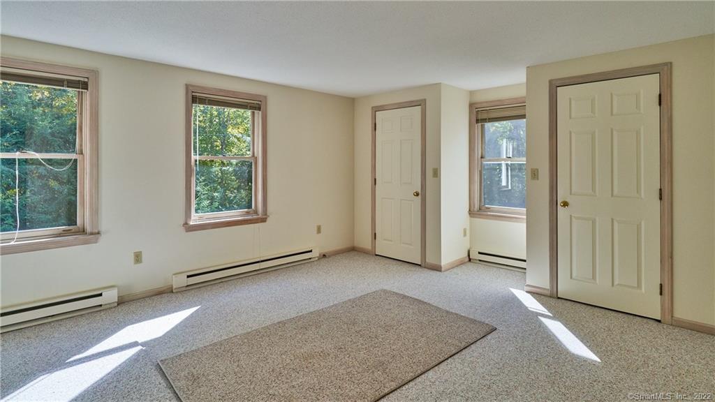 119 Kelseytown Road Clinton, CT 06413 - Photo 11 of 19 an empty room with windows and closet
