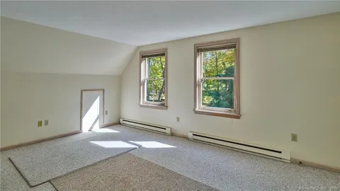 a view of a room with an empty space