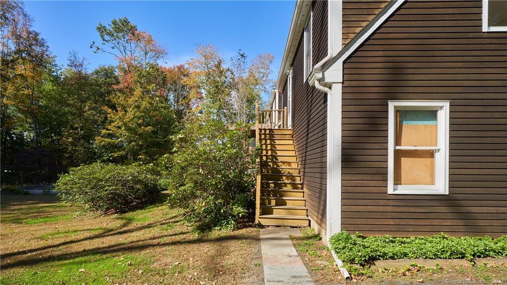 119 Kelseytown Road Clinton, CT 06413 - Photo 2 of 19 a view of a house with a yard