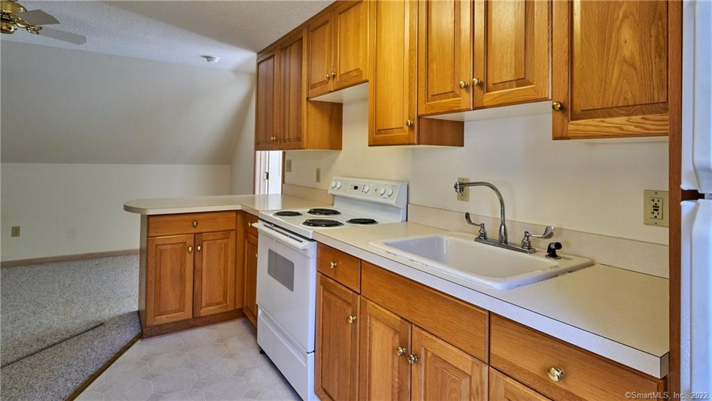 119 Kelseytown Road Clinton, CT 06413 - Photo 10 of 19 a kitchen with stainless steel appliances granite countertop a sink and a cabinets