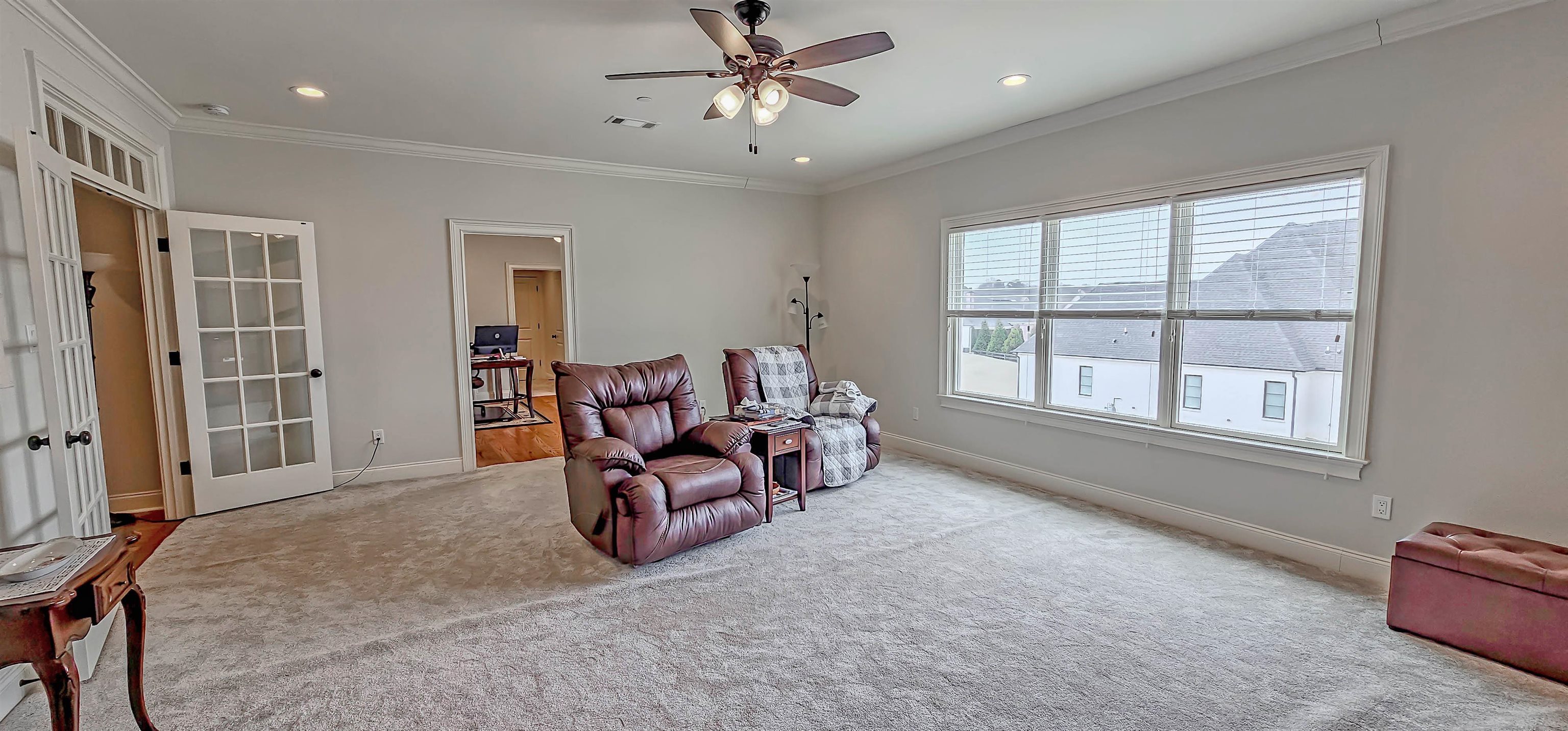 45 North Lake Road Collierville, TN 38017 - Photo 33 of 40 French Doors leads into bonus room from upstairs landing