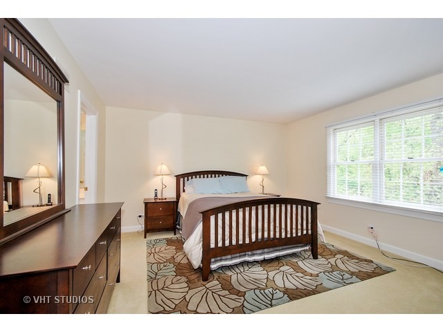 4N632 Hidden Oaks Road St. Charles, IL 60175 - Photo 20 of 25 a bedroom with a bed and a window