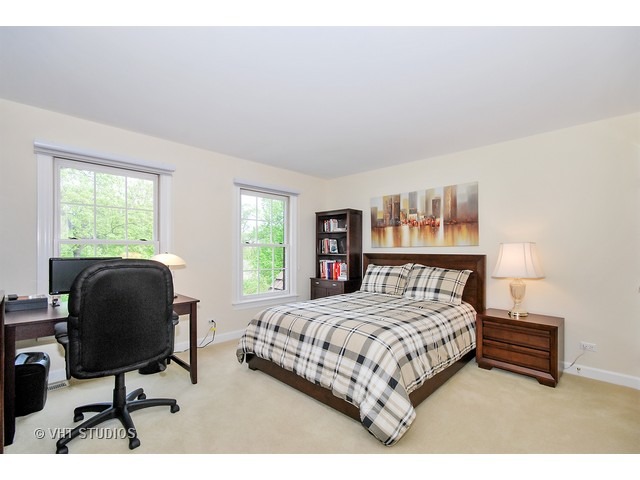 4N632 Hidden Oaks Road St. Charles, IL 60175 - Photo 21 of 25 a bedroom with a bed furniture and a window