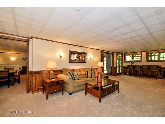 4N632 Hidden Oaks Road St. Charles, IL 60175 - Photo 22 of 25 a living room with furniture and a table