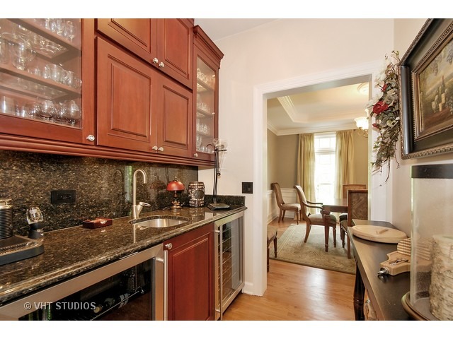 4N632 Hidden Oaks Road St. Charles, IL 60175 - Photo 6 of 25 a kitchen with sink and cabinets