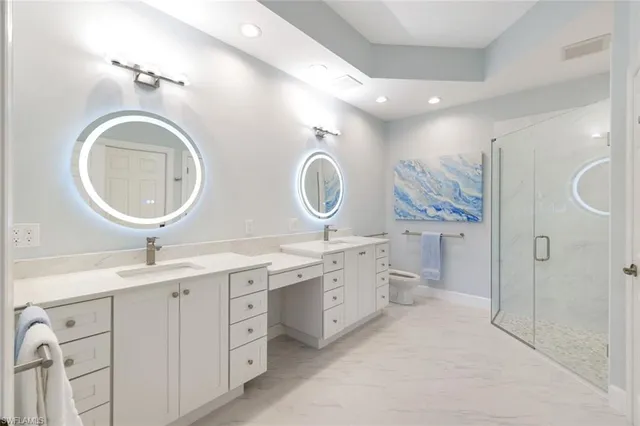 a kitchen with stainless steel appliances granite countertop a stove and cabinets