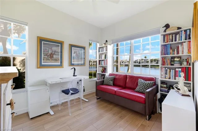 a bathroom with a sink mirror and shower