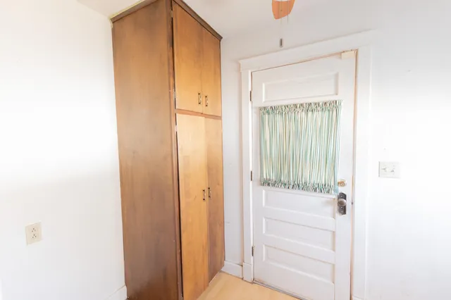 a view of a backyard of the house