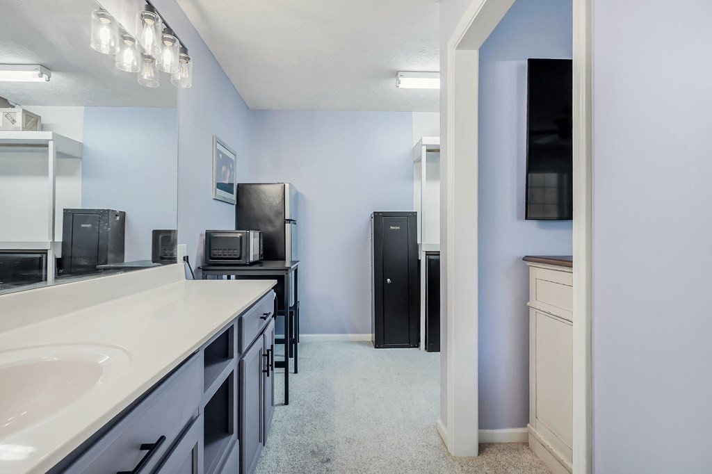 1945 Golden Mountain Road Sparta, TN 38583 - Photo 15 of 47 a kitchen with kitchen island a sink appliances and a counter top space