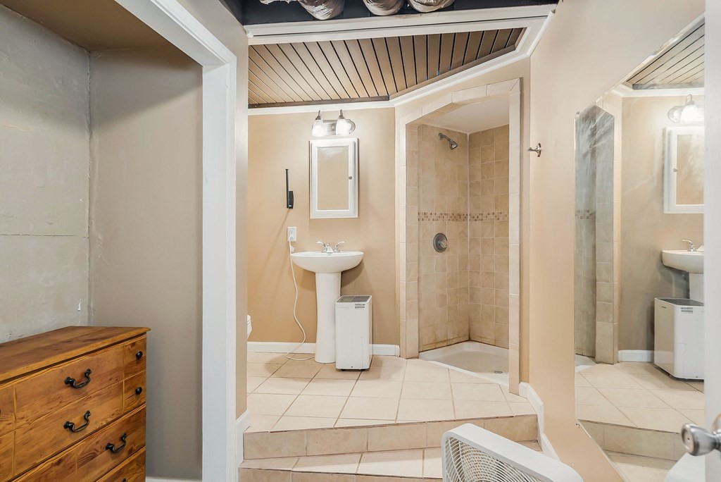 1945 Golden Mountain Road Sparta, TN 38583 - Photo 21 of 47 a bathroom with a sink and a mirror